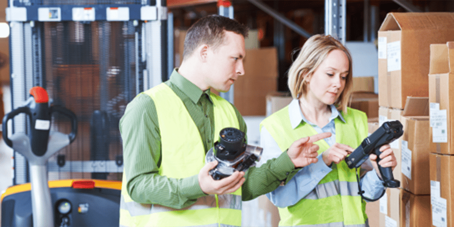 Two people in the Logistics warehouse